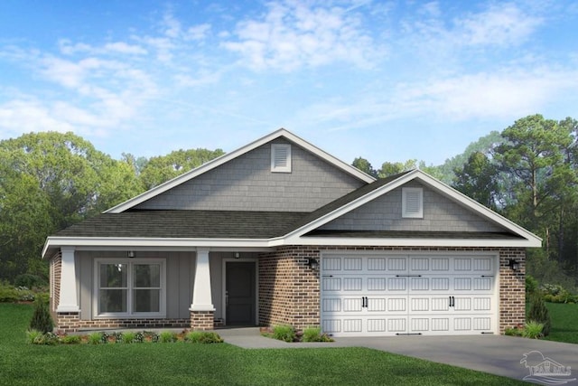 view of front of property with a front yard and a garage