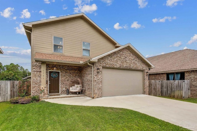 front of property featuring a garage and a front lawn