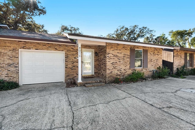 single story home featuring a garage