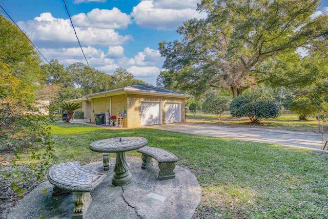 view of yard featuring a garage