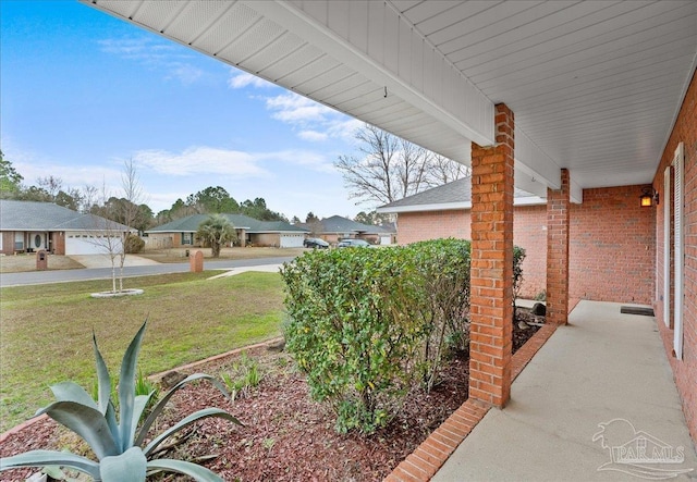 view of yard with a porch