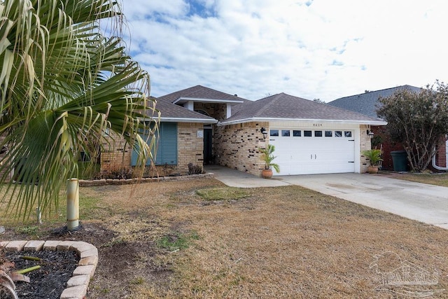 ranch-style home featuring a garage