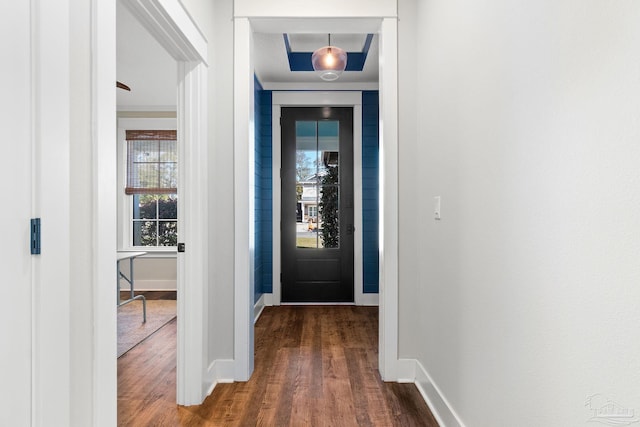 entryway with baseboards and dark wood-style floors