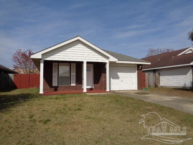 view of front facade with a garage, a porch, and a front yard