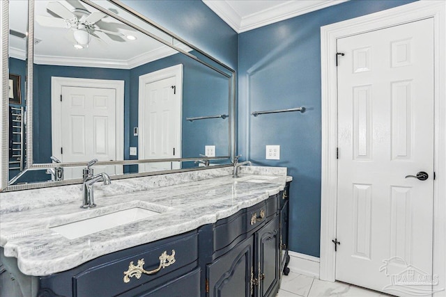 full bathroom featuring marble finish floor, baseboards, ceiling fan, and a sink