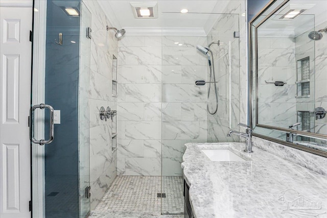full bath with a shower stall, crown molding, and vanity