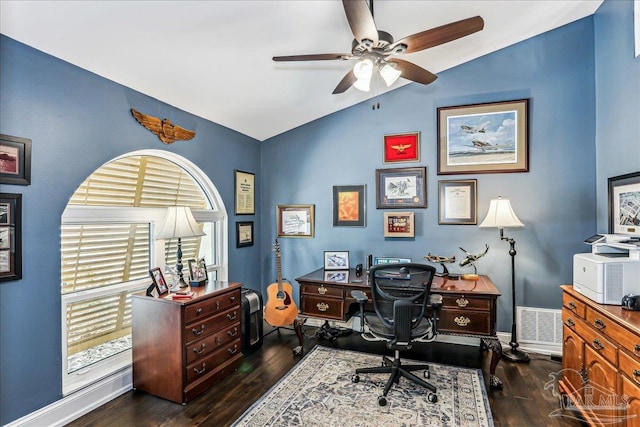 office with dark wood finished floors, ceiling fan, vaulted ceiling, and baseboards