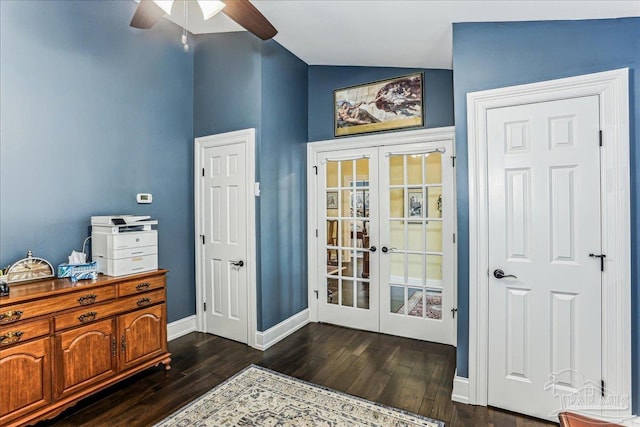 doorway featuring french doors, dark wood-style flooring, vaulted ceiling, baseboards, and a ceiling fan