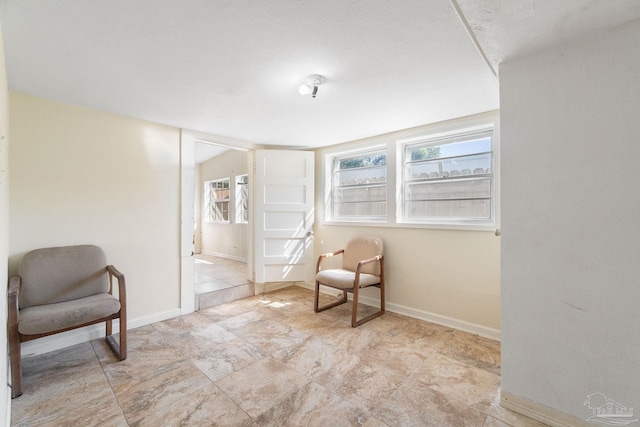 sitting room with baseboards