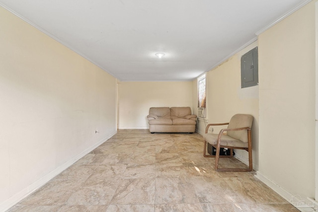 living area featuring crown molding, baseboards, and electric panel