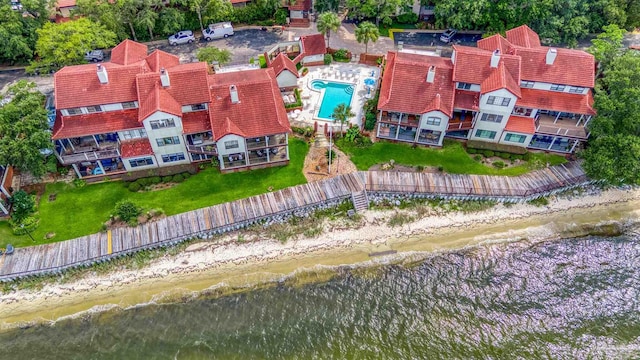 drone / aerial view with a water view