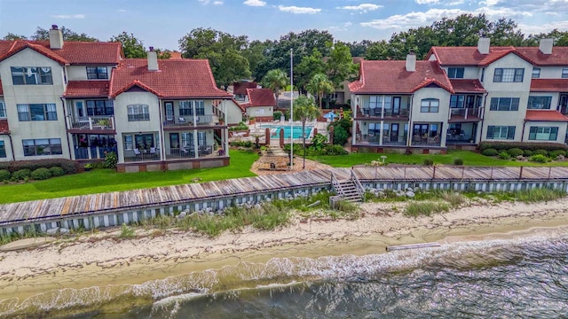 exterior space with a water view