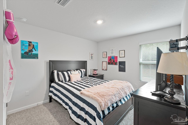 bedroom featuring carpet