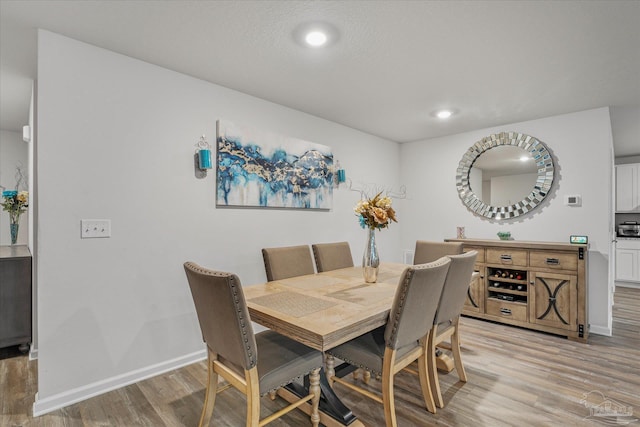 dining room featuring light wood-type flooring