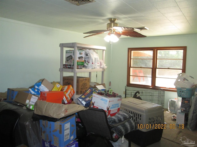 interior space featuring ceiling fan