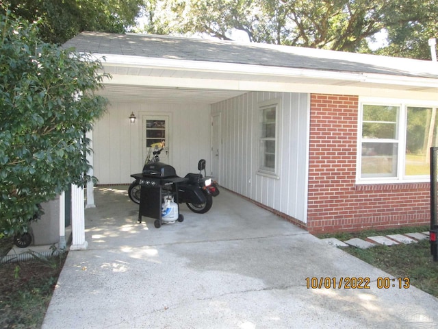 exterior space with a carport