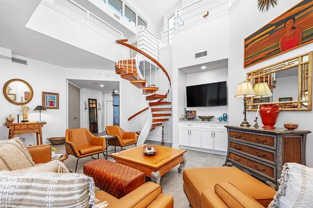13335 Johnson Beach Rd Unit 1003, Pensacola, FL 32507 - living room with light tile patterned floors and a high ceiling