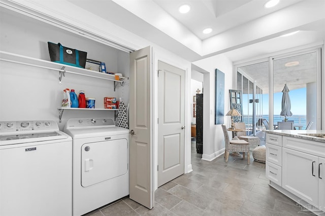 13335 Johnson Beach Rd Unit 1003, Pensacola, FL 32507 - clothes washing area with a water view and washer and dryer