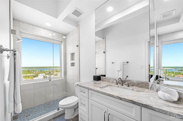 13335 Johnson Beach Rd Unit 1003, Pensacola, FL 32507 - bathroom with a water view, vanity, a wealth of natural light, and walk in shower