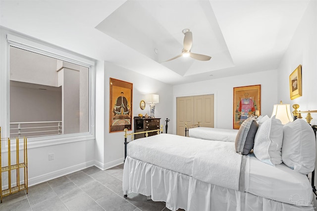 13335 Johnson Beach Rd Unit 1003, Pensacola, FL 32507 - bedroom featuring a raised ceiling and ceiling fan