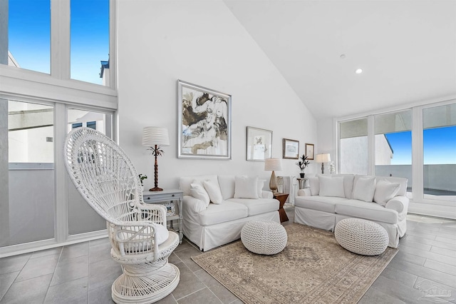 13335 Johnson Beach Rd Unit 1003, Pensacola, FL 32507 - living room featuring a healthy amount of sunlight and high vaulted ceiling