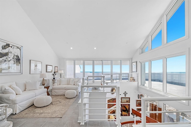 13335 Johnson Beach Rd Unit 1003, Pensacola, FL 32507 - tiled living room featuring high vaulted ceiling and a healthy amount of sunlight