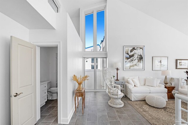 13335 Johnson Beach Rd Unit 1003, Pensacola, FL 32507 - tiled living room with high vaulted ceiling