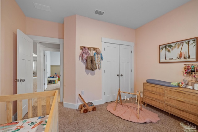 bedroom with carpet flooring and a closet