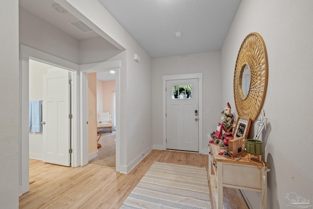 foyer featuring light hardwood / wood-style flooring