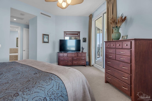 bedroom featuring ensuite bathroom, light carpet, access to exterior, and ceiling fan