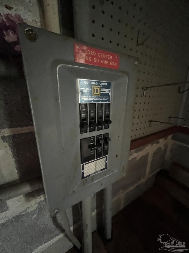 utility room featuring electric panel