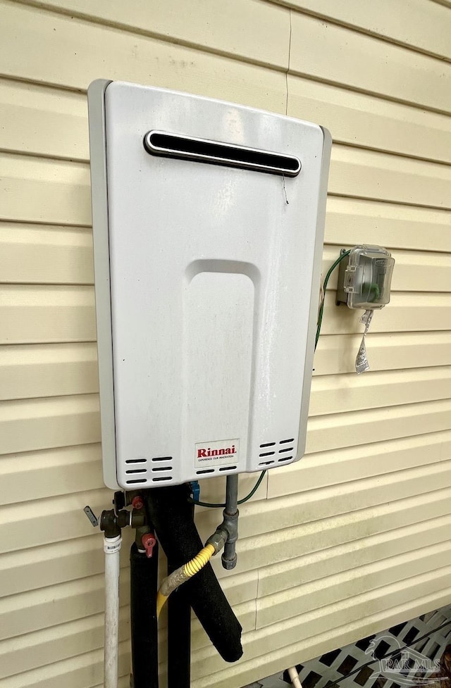 exterior details with tankless water heater