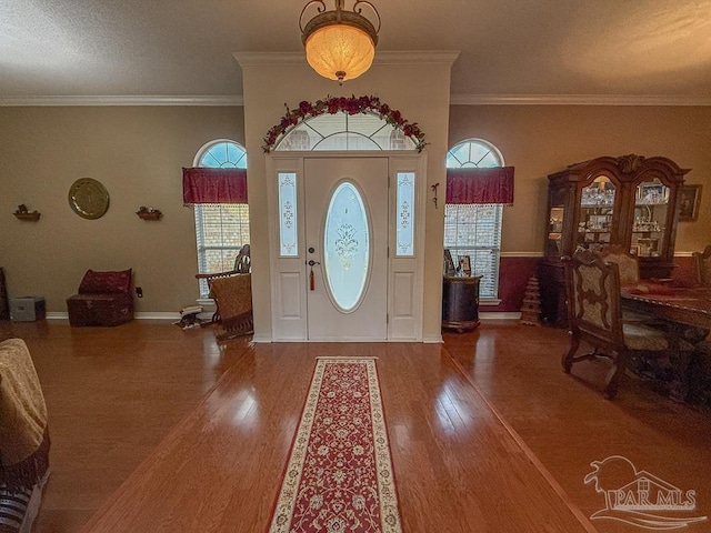 5020 Lantana Dr, Gulf Breeze, FL 32563 - foyer entrance with wood finished floors, baseboards, and ornamental molding