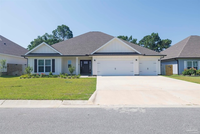 ranch-style house with a garage and a front lawn