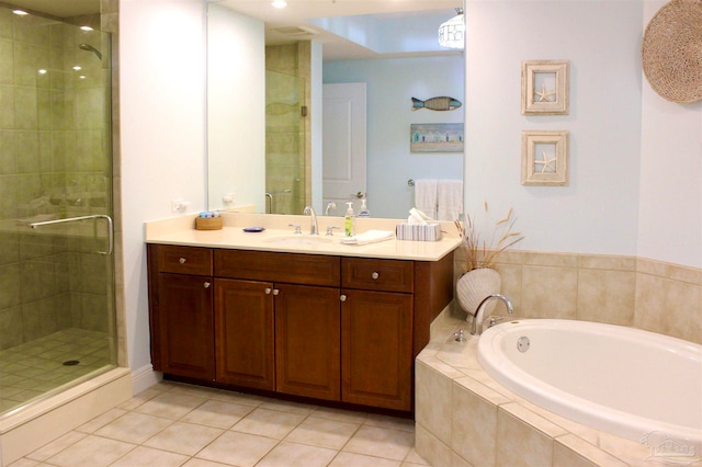 bathroom featuring vanity, separate shower and tub, and tile patterned flooring