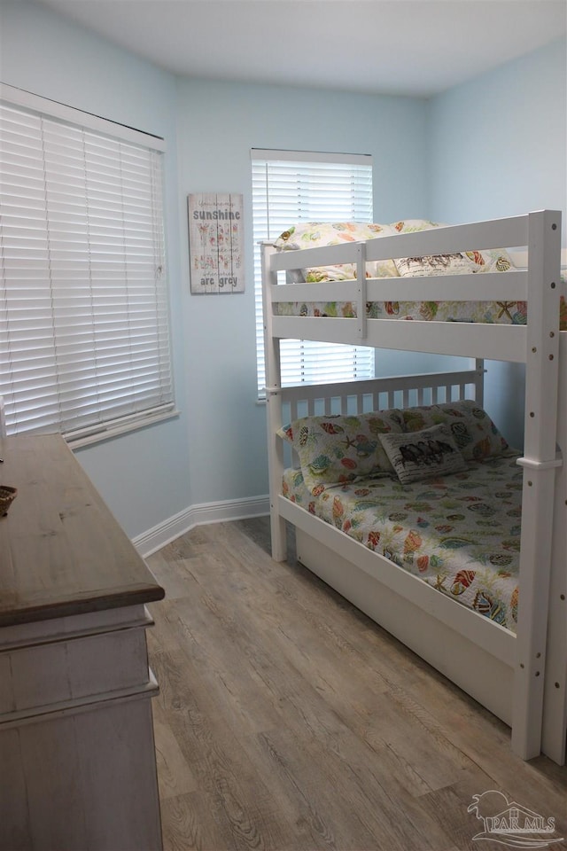 bedroom featuring hardwood / wood-style flooring