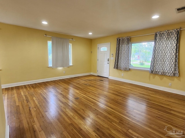 empty room with wood-type flooring