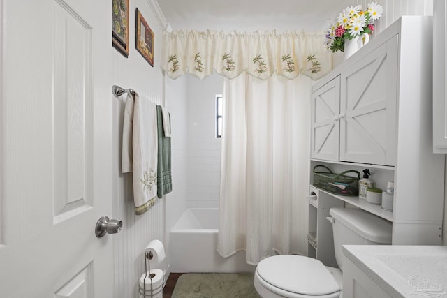 full bathroom with vanity, shower / bath combination with curtain, and toilet