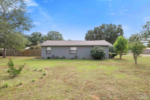 view of property exterior with a yard