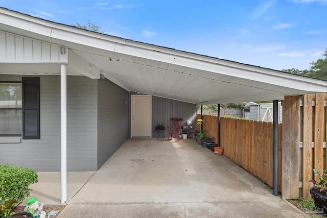 view of vehicle parking featuring a carport