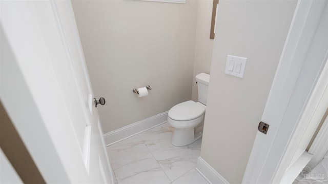 bathroom featuring toilet