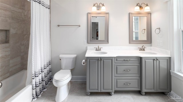 full bathroom with vanity, toilet, and shower / tub combo