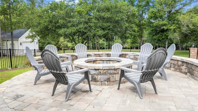 view of patio / terrace featuring a fire pit