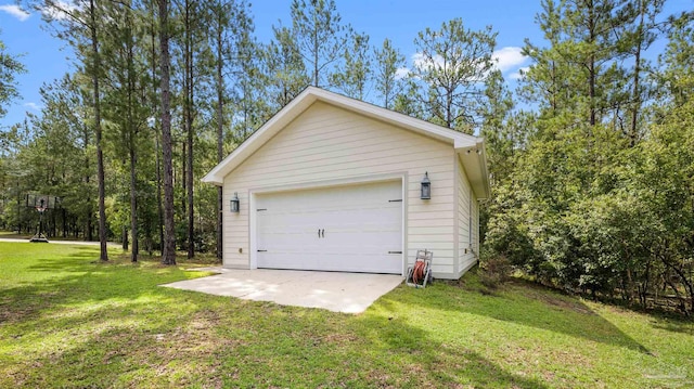 garage with a yard