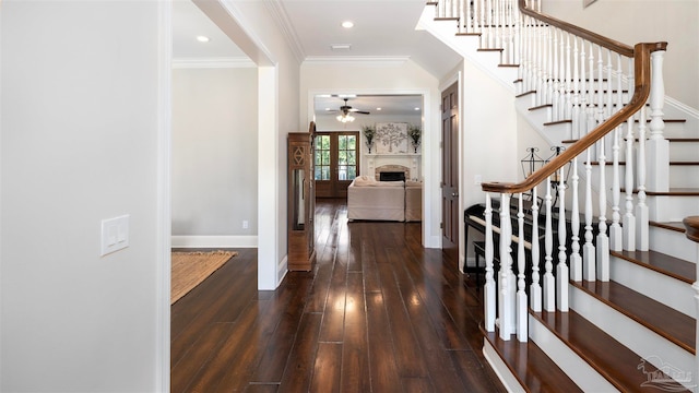 entrance foyer featuring ornamental molding, french doors, and dark hardwood / wood-style floors