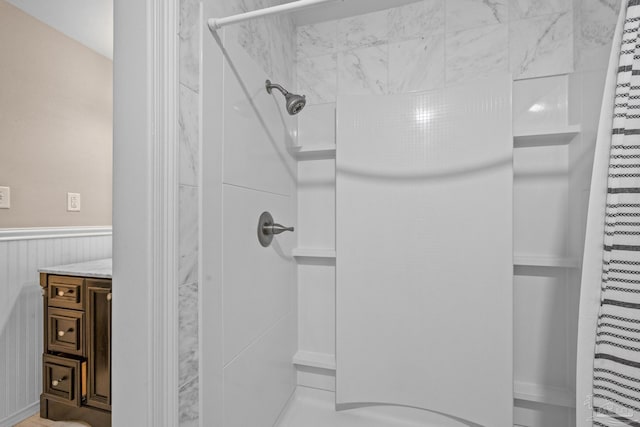 bathroom with a shower with shower curtain