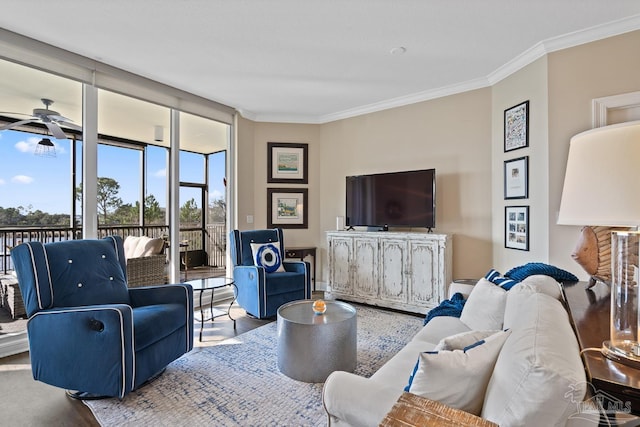 living room with ceiling fan, wood-type flooring, and ornamental molding