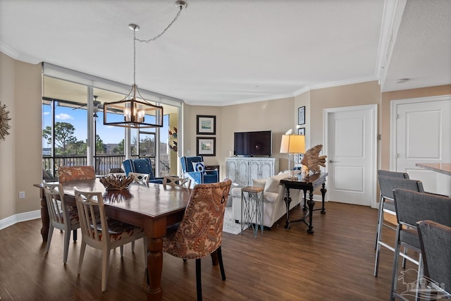 dining area featuring a notable chandelier, dark hardwood / wood-style flooring, and ornamental molding