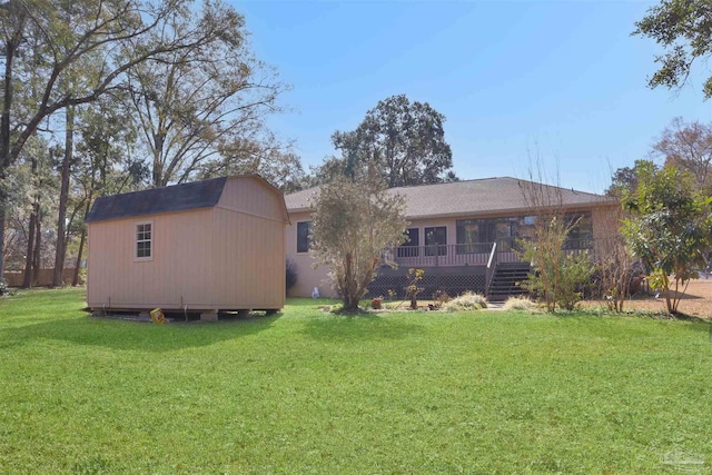 back of property featuring a lawn and a sunroom