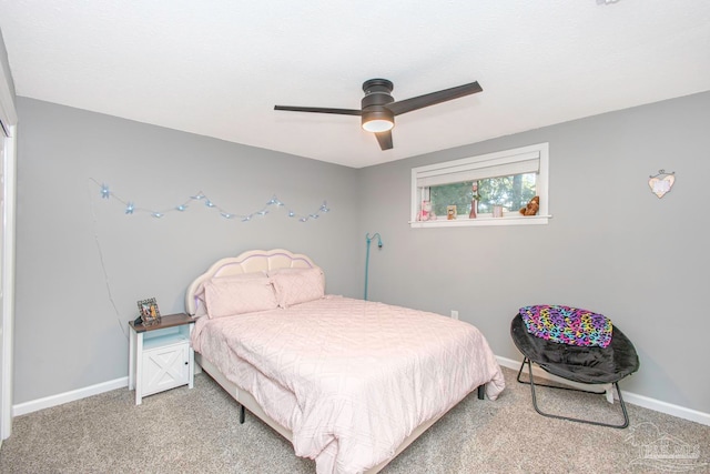 bedroom with ceiling fan and carpet